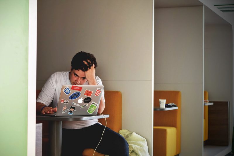 using a laptop in a cafe